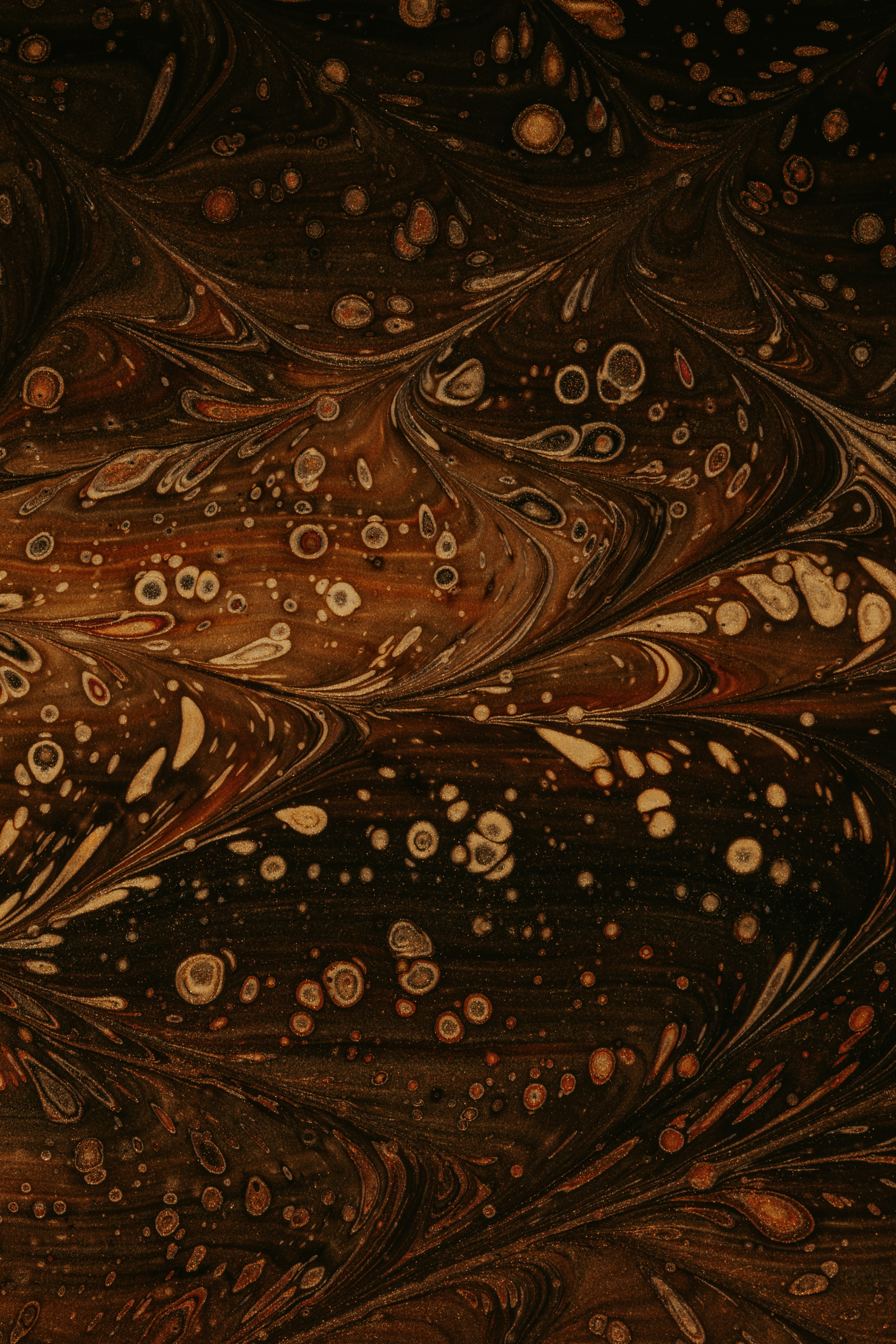 brown and black floral textile